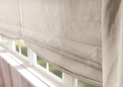 white color artisan shades on window